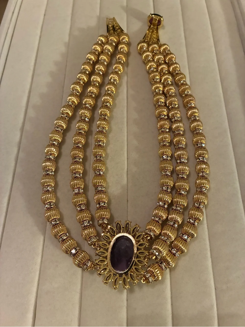 Catwalk Jon Elegant Gold Beaded Necklace with amethyst cabochon Centerpiece